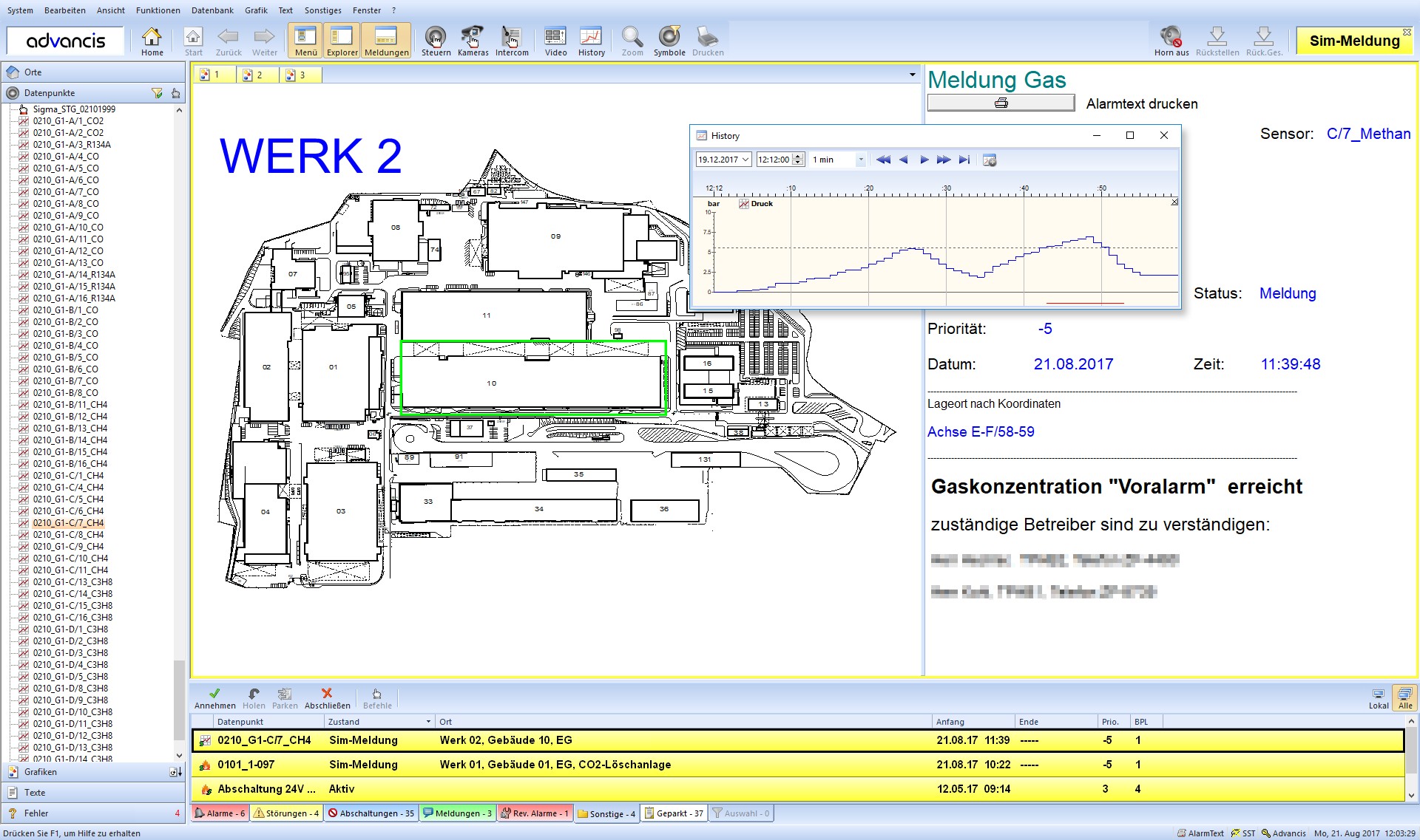 WinGuard fire alarm at the Henkel site: building, alarm point and floor in the header, the full action text with access route and hazard information, and the floor plan with the triggered detector highlighted.